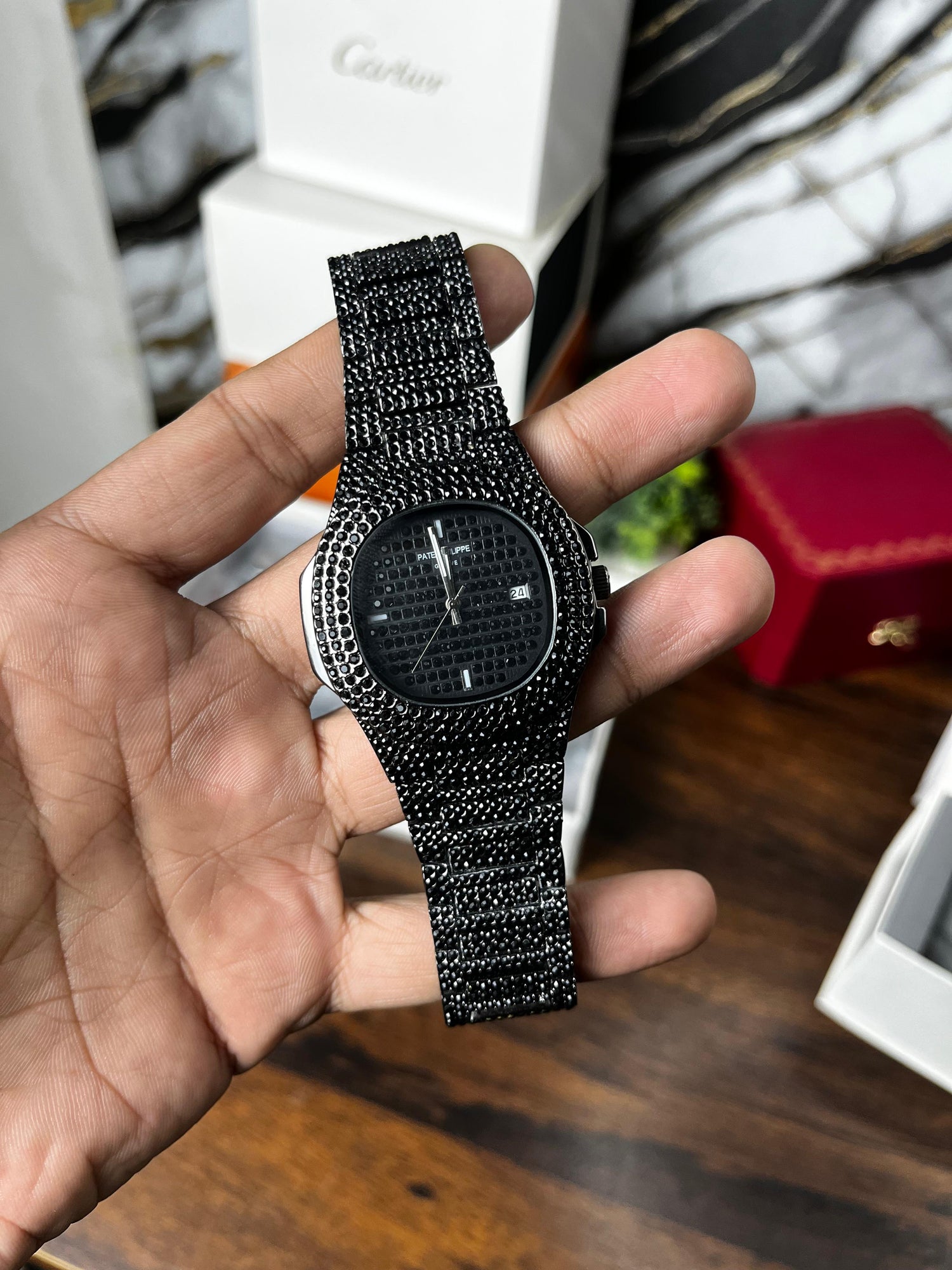 Fully Stoned Black Patek Nautilus