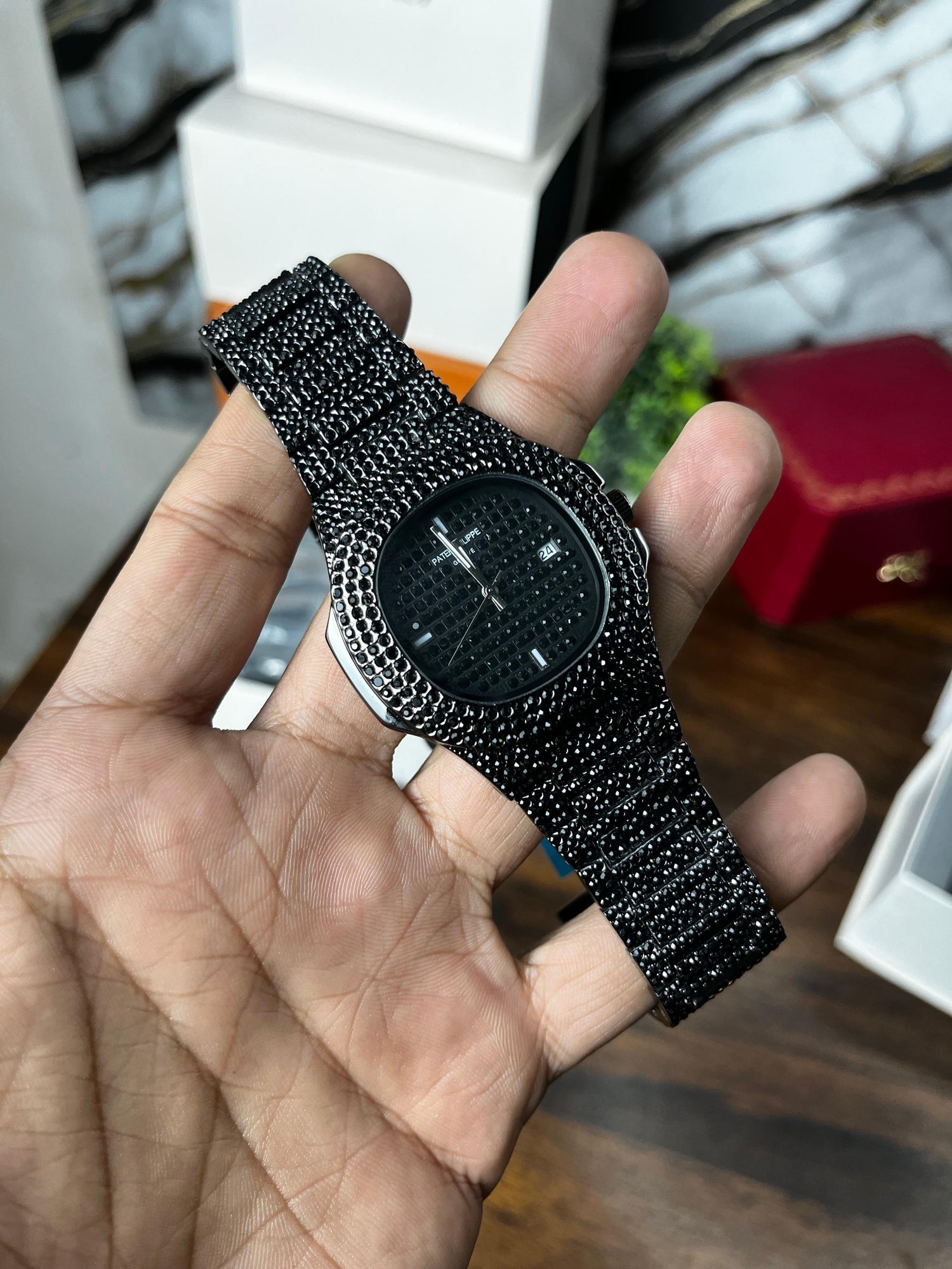 Fully Stoned Black Patek Nautilus